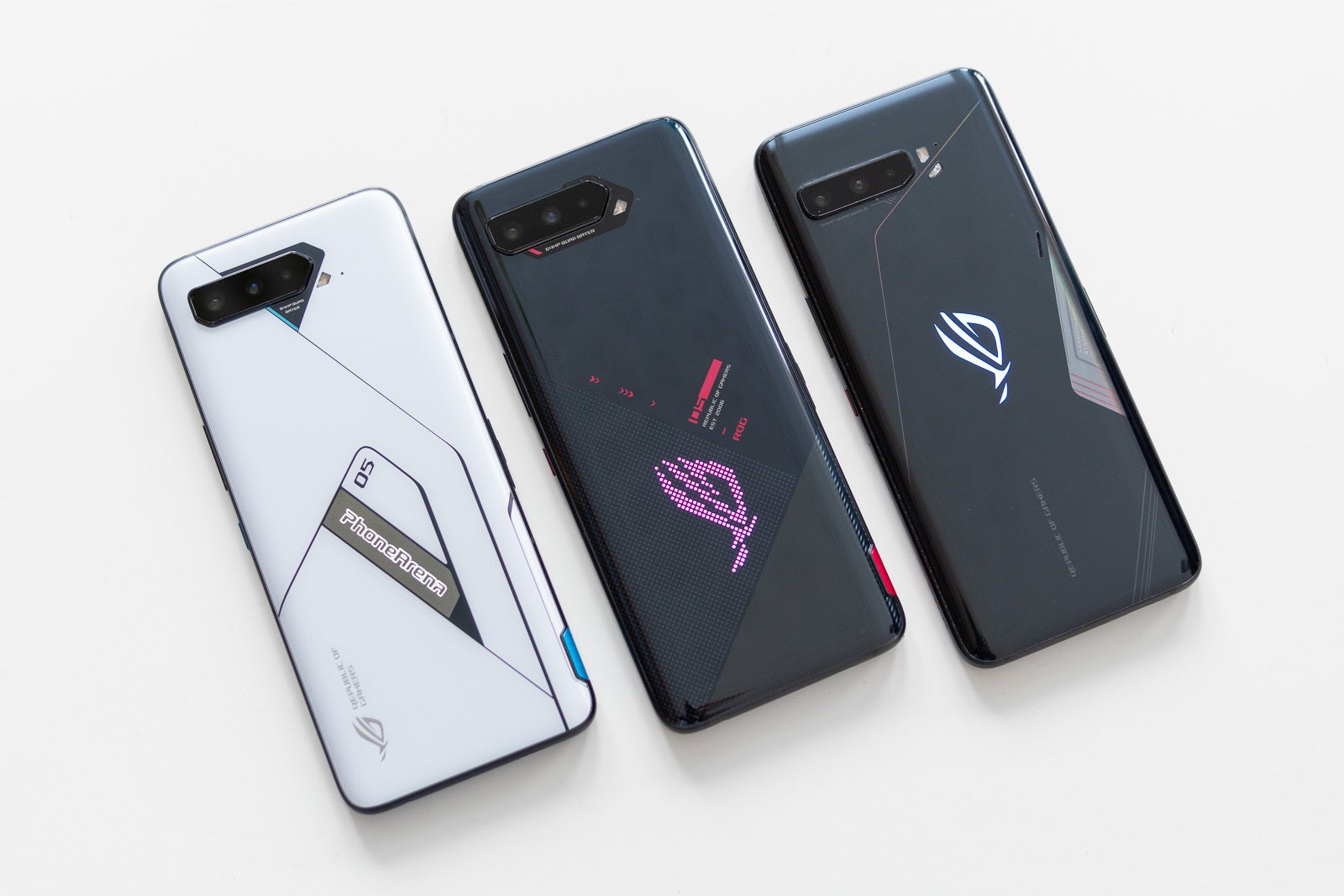 The Asus ROG Phone 5 Ultimate (left), the ROG Phone 5 (center) and their predecessor, the ROG Phone 3 (right) - Asus ROG Phone 5 Ultimate review