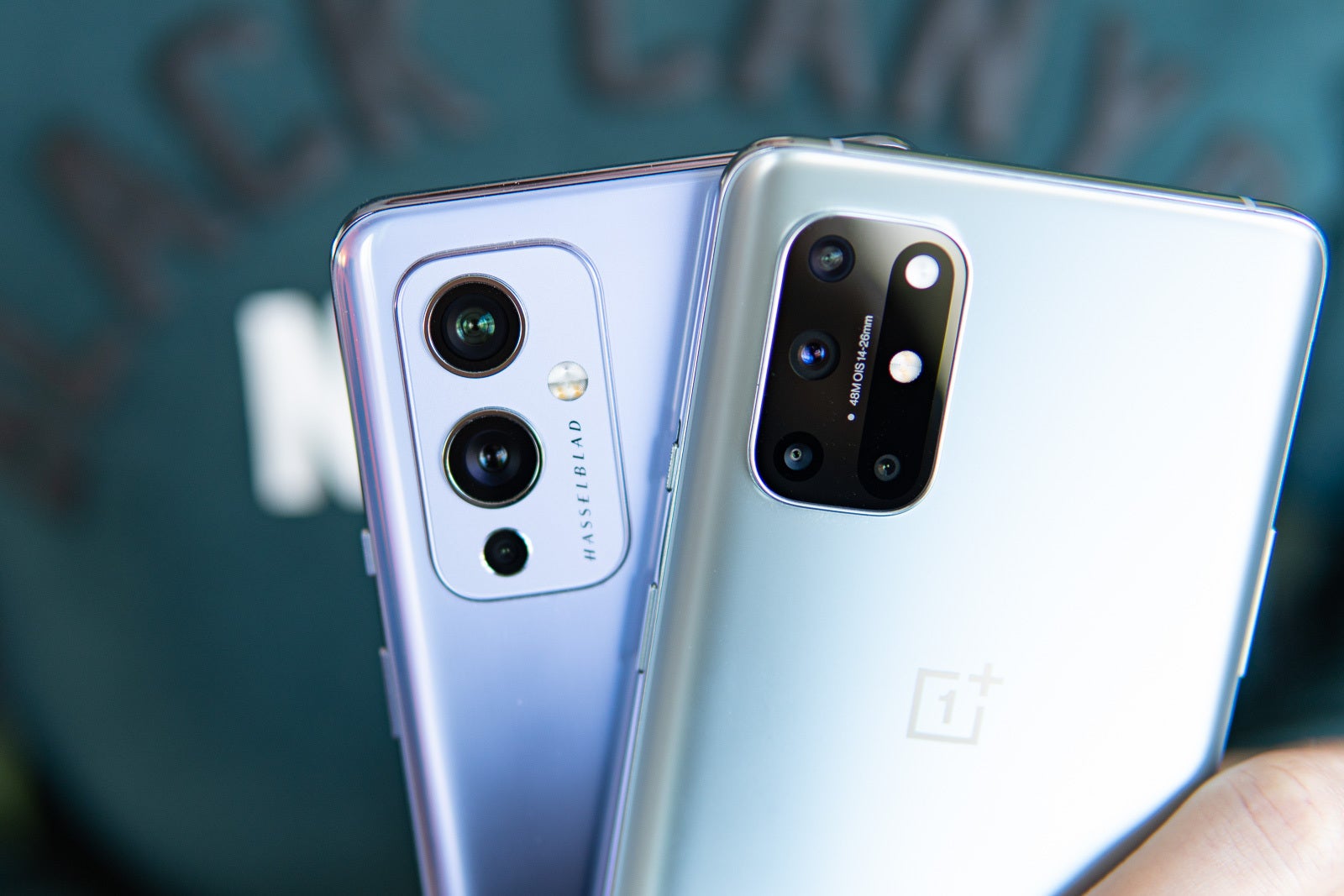 The OnePlus 9 camera module with Hasselblad branding (left) and the OnePlus 8T camera module - OnePlus 9 vs OnePlus 8T