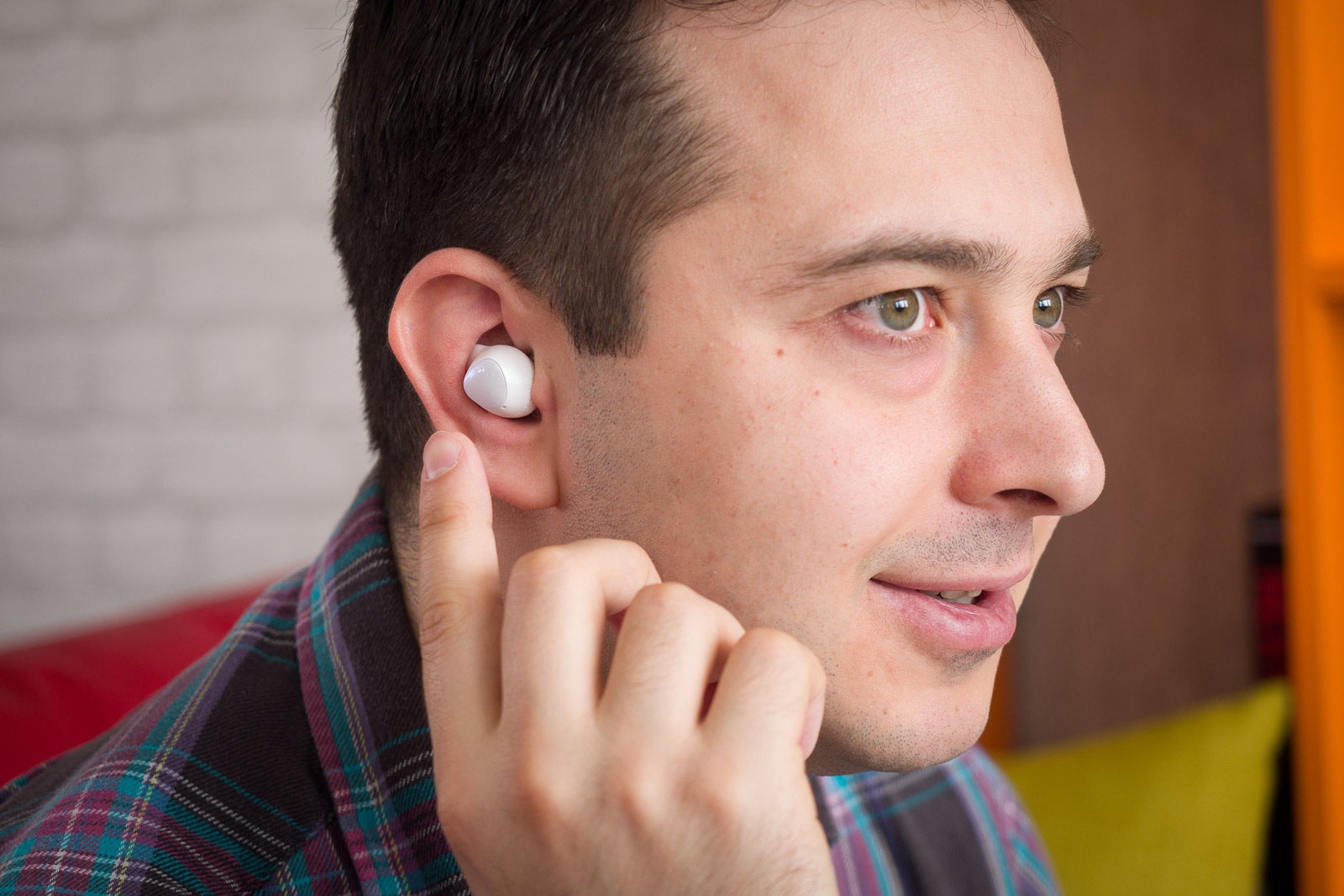 Galaxy Buds 1 in-ear, note how their touch-sensitive area is a different color, which likely won&#039;t be the case with the Buds 2 - Samsung Galaxy Buds 2 vs Galaxy Buds 1: Differences we expect so far