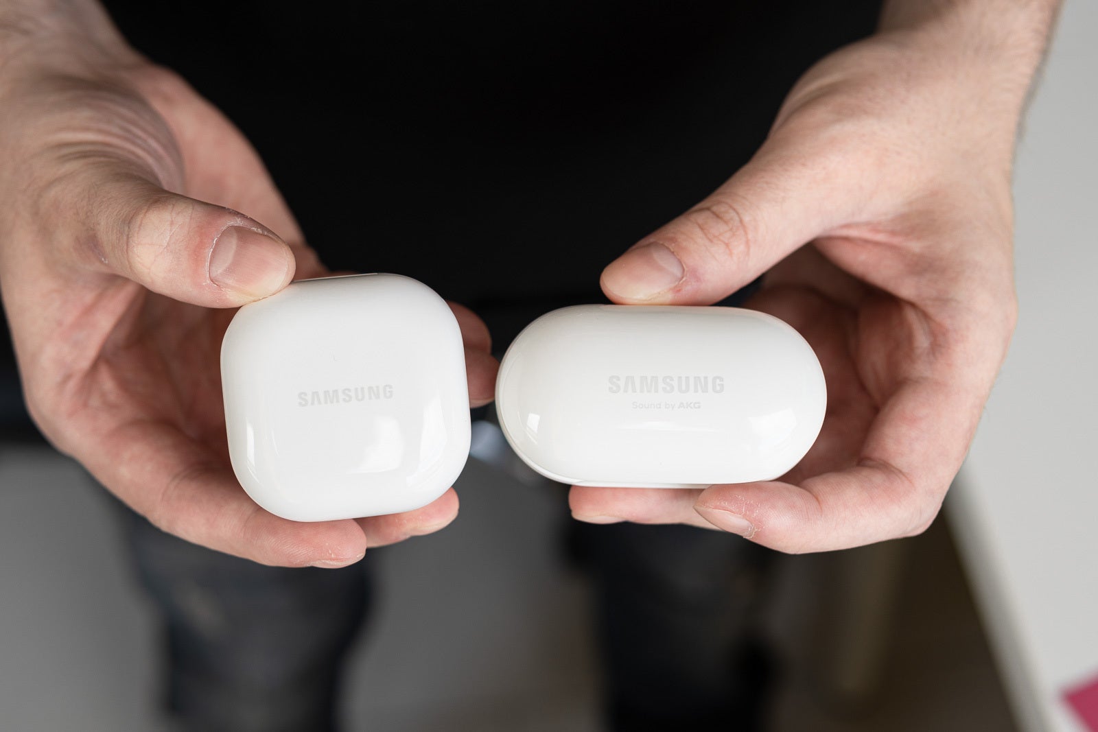 The Galaxy Buds 2 case (left) and the Galaxy Buds Plus case (right) - Samsung Galaxy Buds 2 vs Galaxy Buds Plus – one in, one out