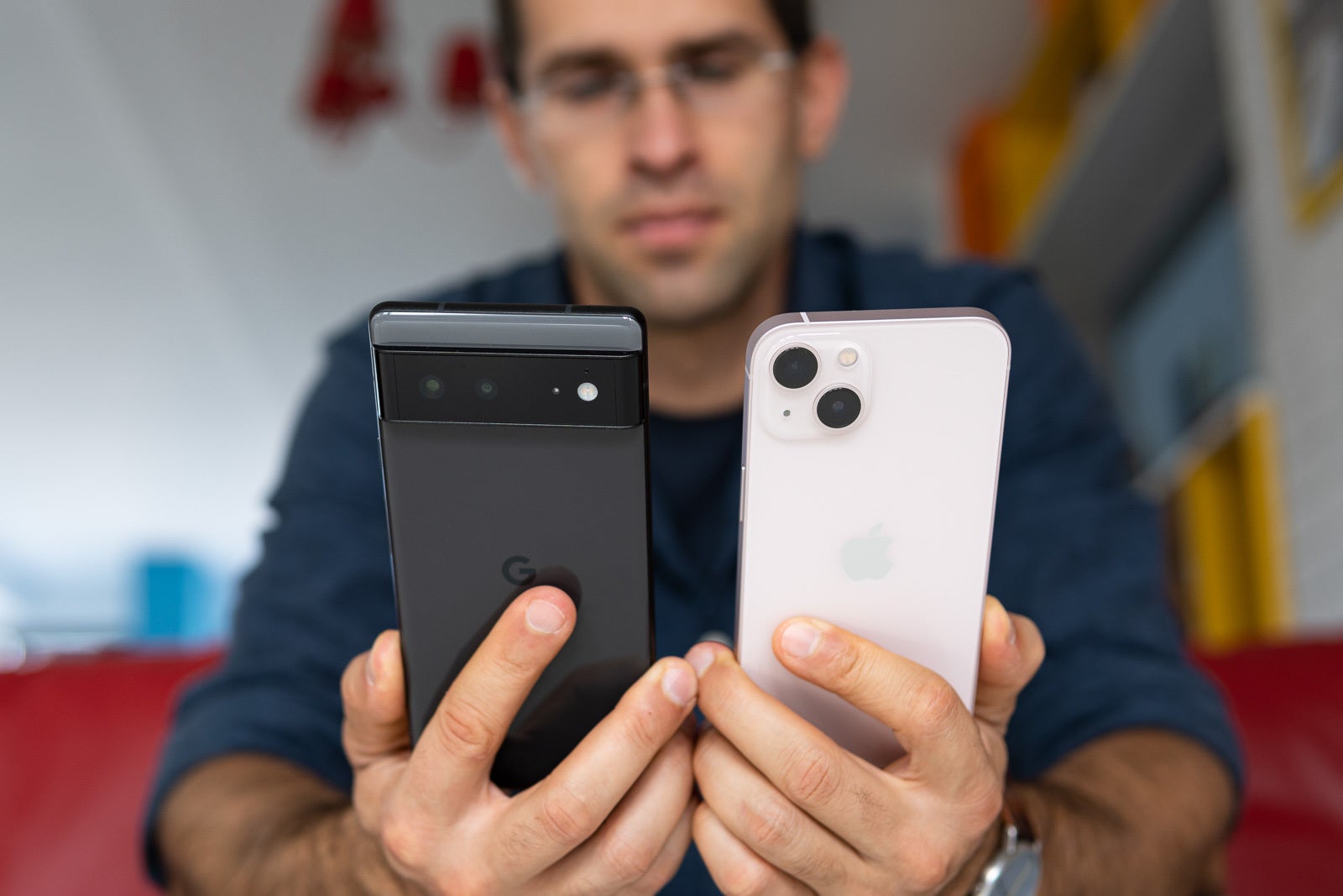Pixel 6 features a dual rear camera in a distinct vertical bar that sticks out the back - Google Pixel 6 vs Apple iPhone 13