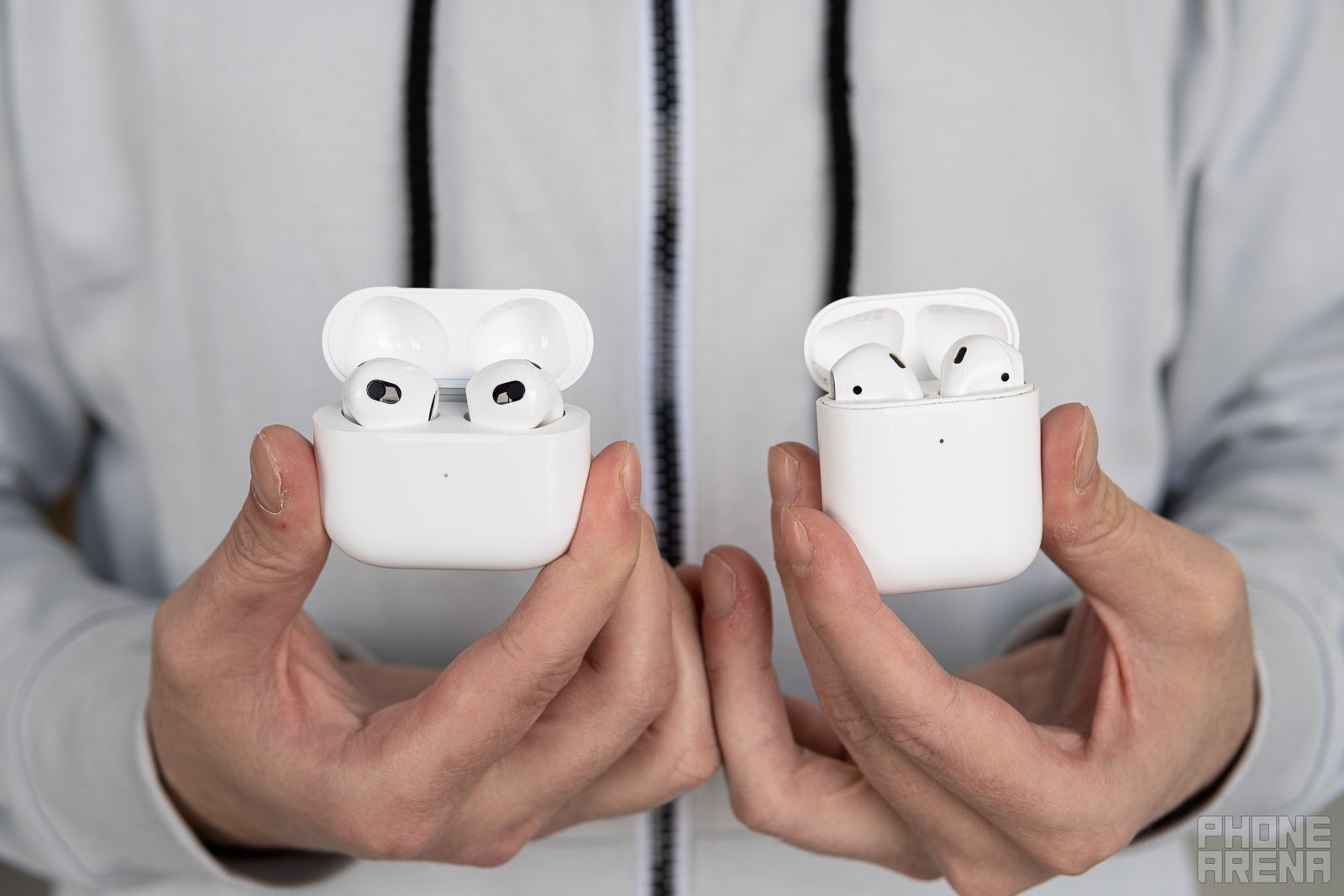The AirPods 3 (left) and AirPods 2 (right) - AirPods 3 vs AirPods 2: Visible evolution