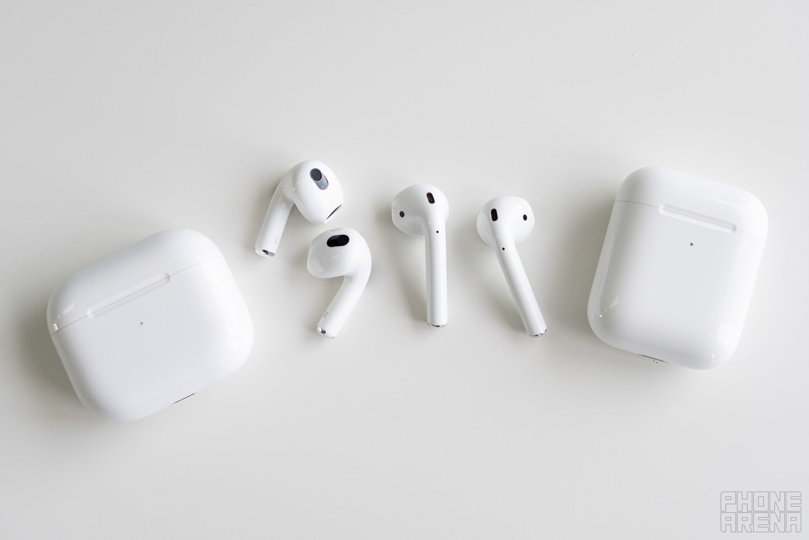 The AirPods 3 (left) and AirPods 2 (right) - AirPods 3 vs AirPods 2: Visible evolution