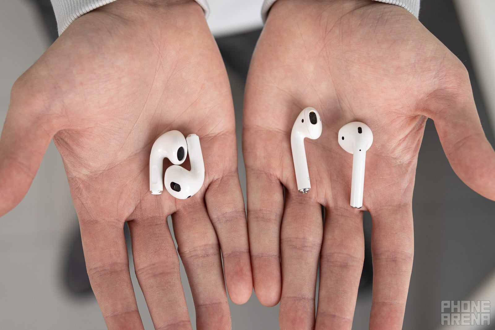 The AirPods 3 (left) and AirPods 2 (right) - AirPods 3 vs AirPods 2: Visible evolution