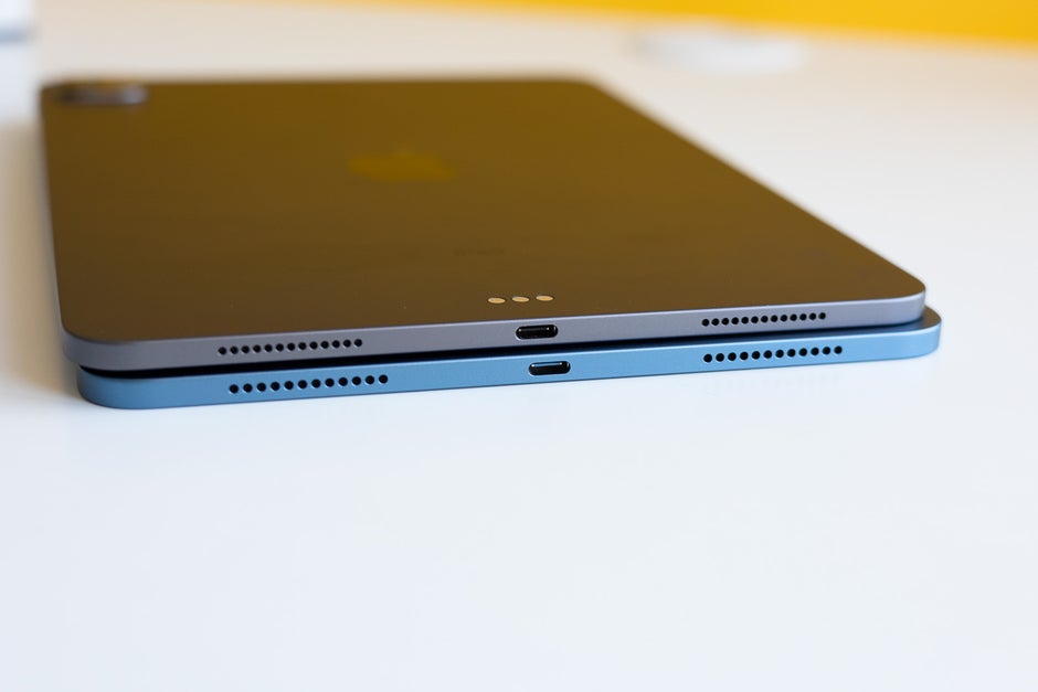 iPad Air 5 - bottom, iPad Pro - top; both charge via a USB Type-C port on the bottom - iPad Air (2022) vs 11-inch iPad Pro (2021): Save your money