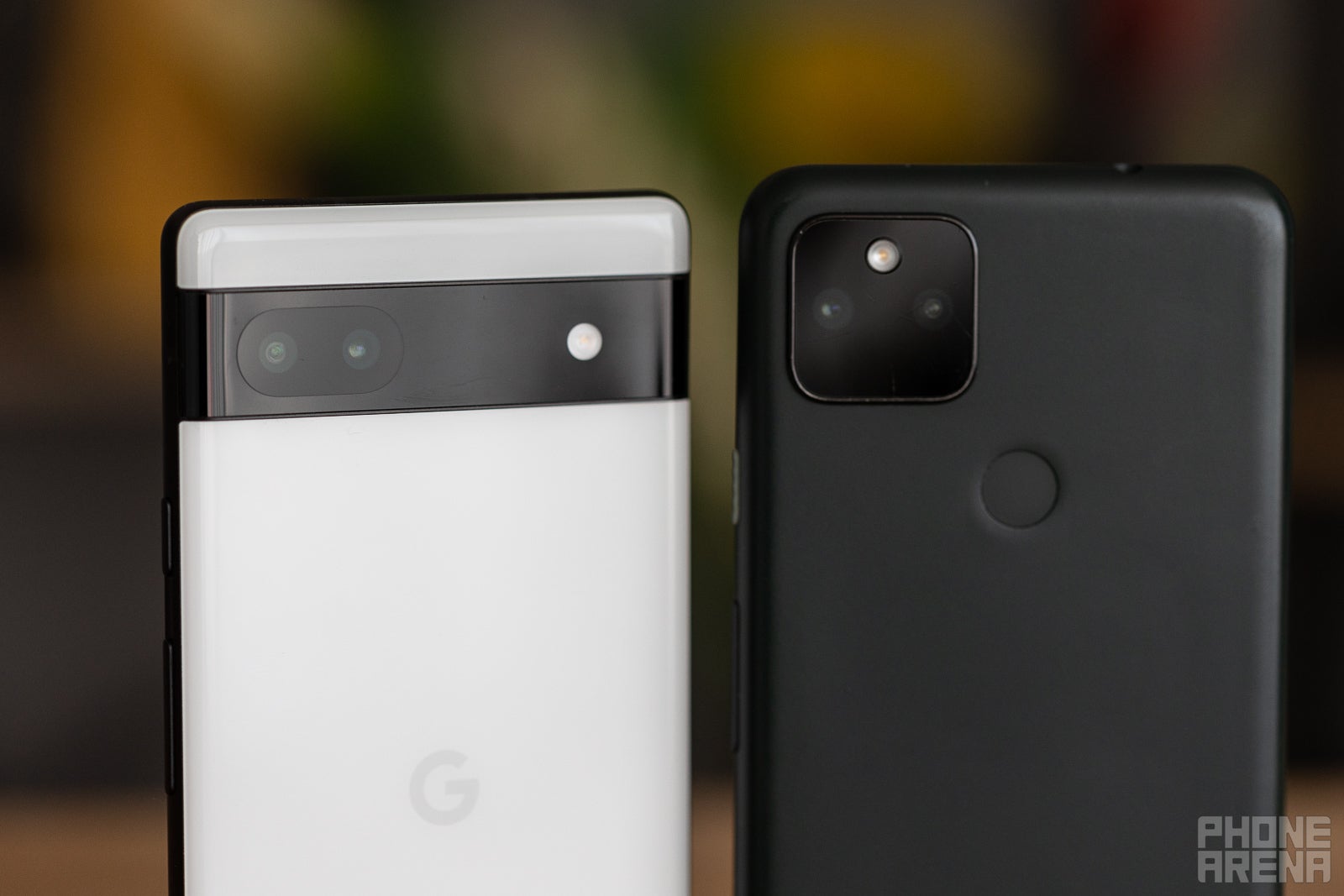 The Pixel 6a&#039;s horizontal camera module (left) and Pixel 5a&#039;s square one (right) - Google Pixel 6a vs Pixel 5a comparison: Twice the performance!