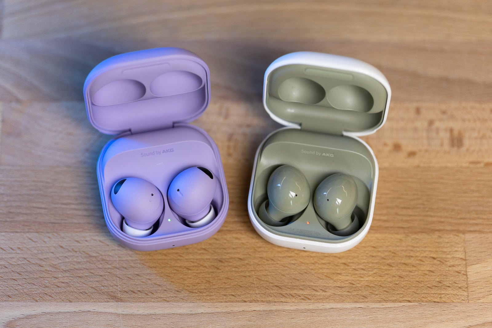(Image credit - PhoneArena) Galaxy Buds 2 Pro (left) and Galaxy Buds 2 (right) - Galaxy Buds 2 Pro vs Galaxy Buds 2: Can you hear a difference? Or even see it?