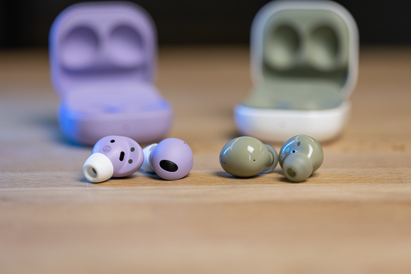 (Image credit - PhoneArena) Galaxy Buds 2 Pro (left) and Galaxy Buds 2 (right) - Galaxy Buds 2 Pro vs Galaxy Buds 2: Can you hear a difference? Or even see it?