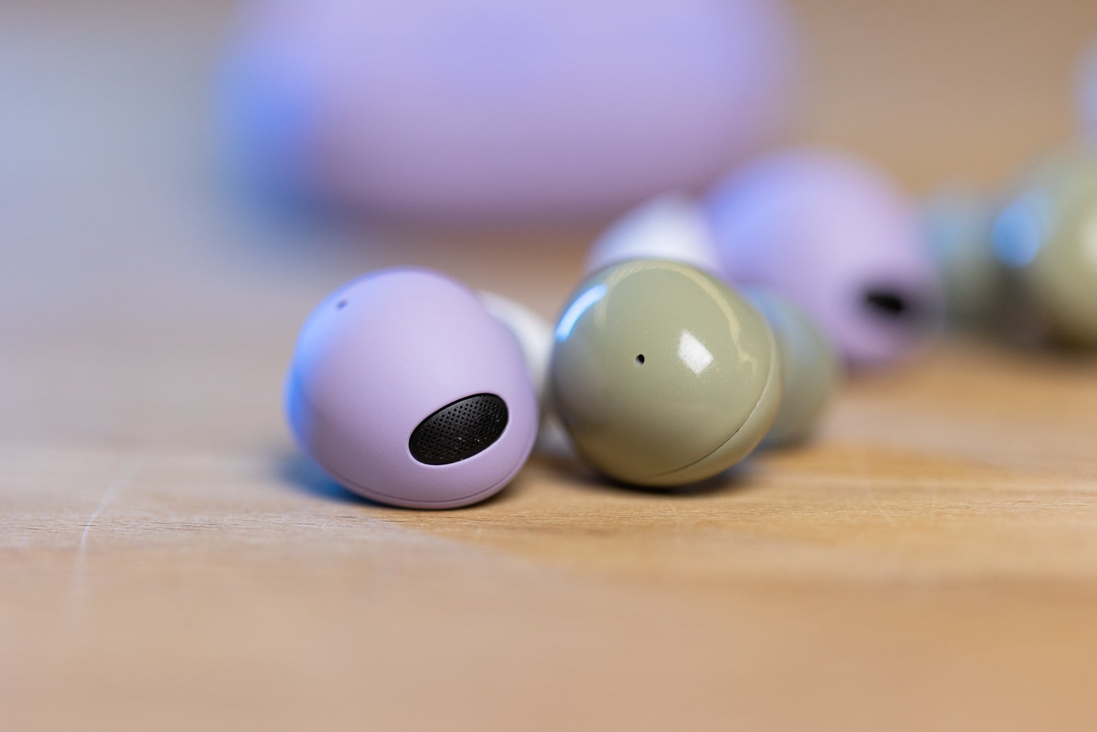 (Image credit - PhoneArena) Galaxy Buds 2 Pro earbud (left) and Galaxy Buds 2 (right) - Galaxy Buds 2 Pro vs Galaxy Buds 2: Can you hear a difference? Or even see it?