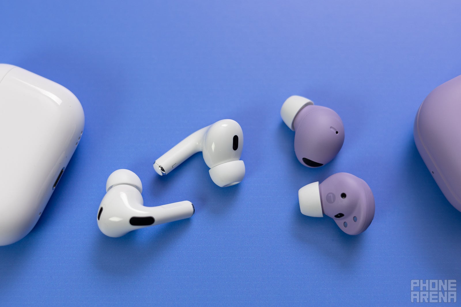 (Image credit - PhoneArena) Apple AirPods Pro 2 (left) and Samsung Galaxy Buds 2 Pro (right) - AirPods Pro 2 vs Galaxy Buds 2 Pro: Team Apple or team Samsung – everyone wins!