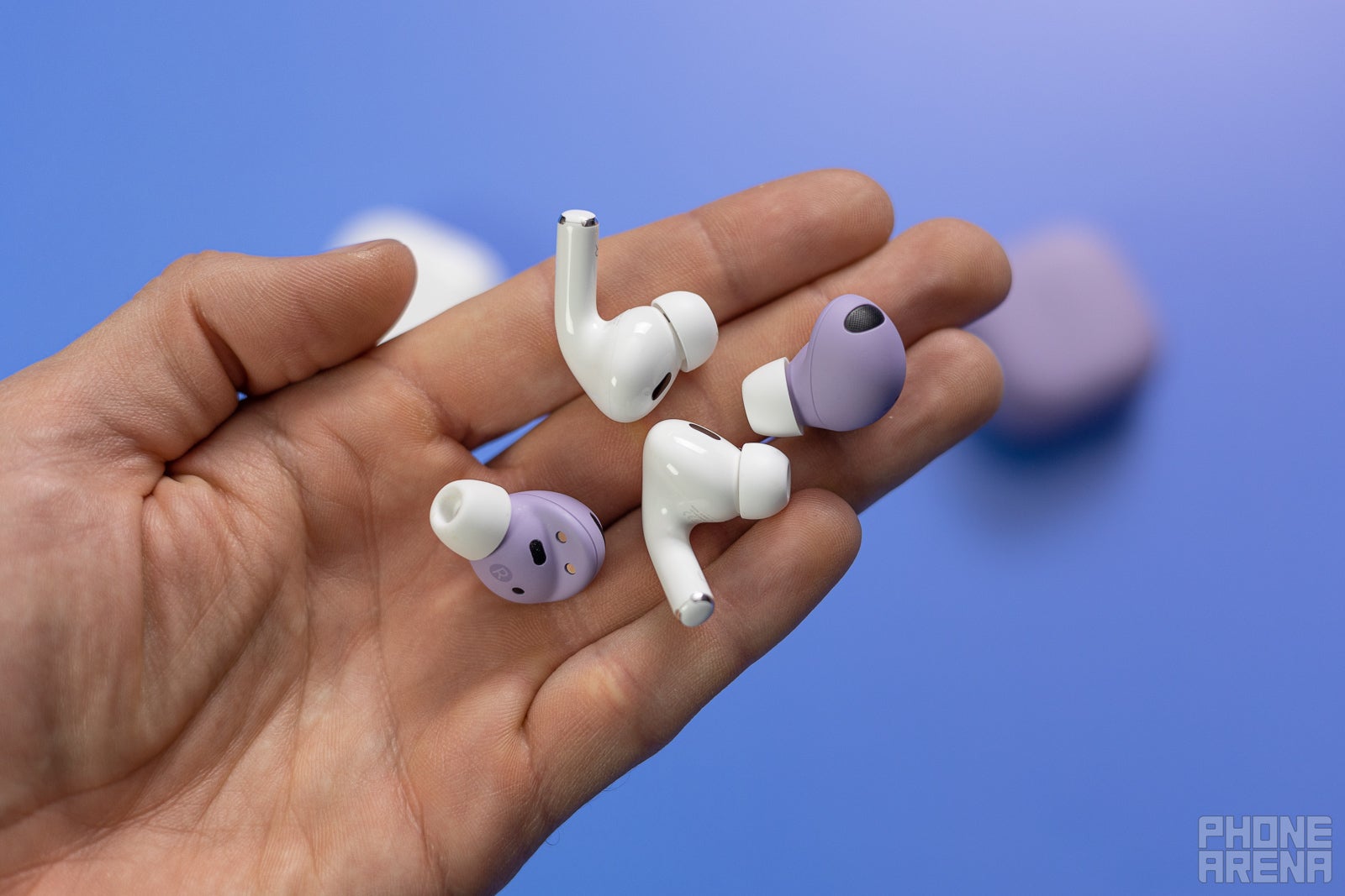 (Image credit - PhoneArena) Apple AirPods Pro 2 and Samsung Galaxy Buds 2 Pro earbuds - AirPods Pro 2 vs Galaxy Buds 2 Pro: Team Apple or team Samsung – everyone wins!
