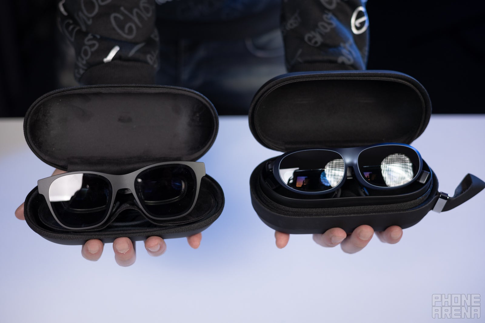 (Image credit - PhoneArena) The Xreal Air (left) and Rokid Max (right) in their carrying cases - Xreal Air vs Rokid Max: The best consumer AR glasses right now? Which should you buy in 2023?