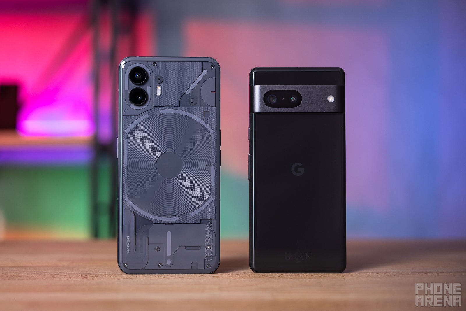 Both of these phones ooze character (Image credit - PhoneArena - Nothing Phone (2) vs Google Pixel 7: budget, with character