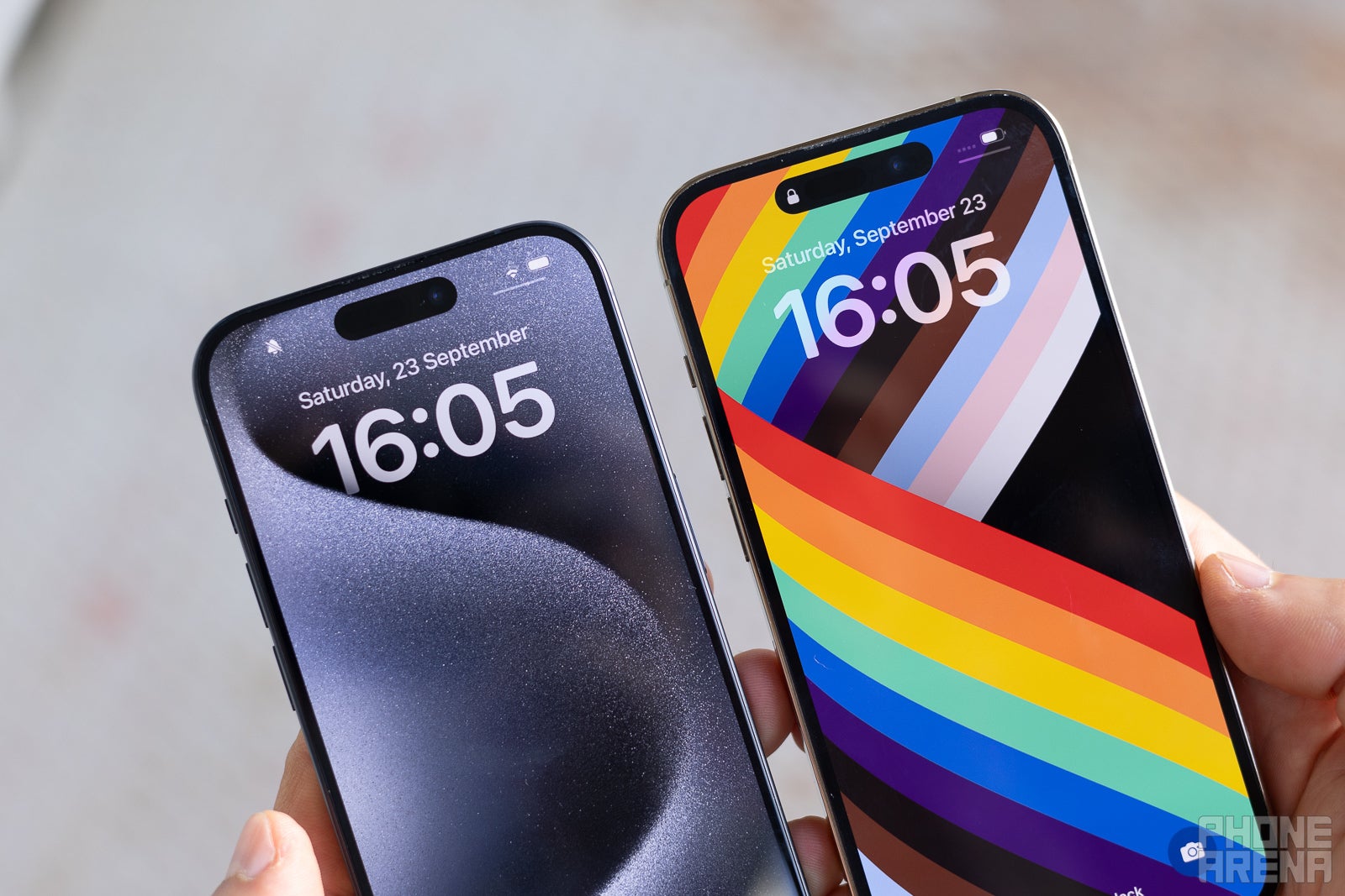 (Image Credit - PhoneArena) iPhone 15 Pro has thinner borders around the screen compared to 14 Pro on the right - iPhone 15 Pro Review: enter the era of USB-C
