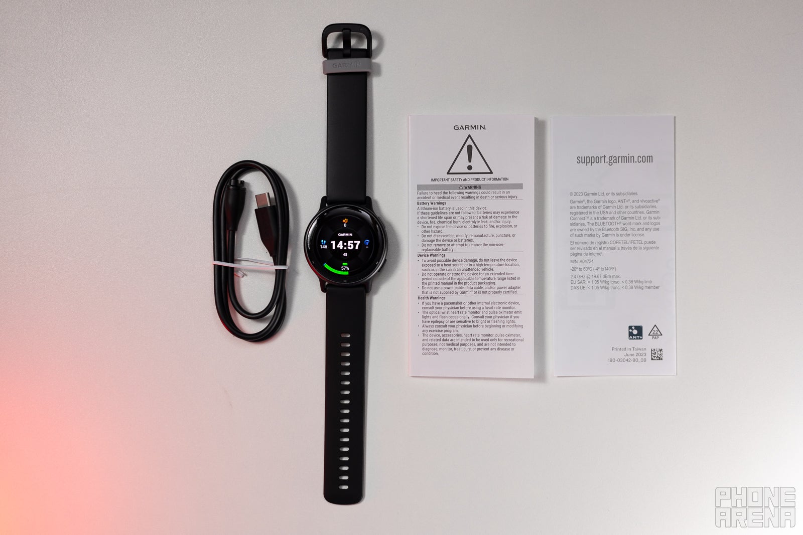 You get a very barebones package with the watch, a charging cable and a user manual (Image by PhoneArena) - Garmin Vivoactive 5 Review: $300 well spent