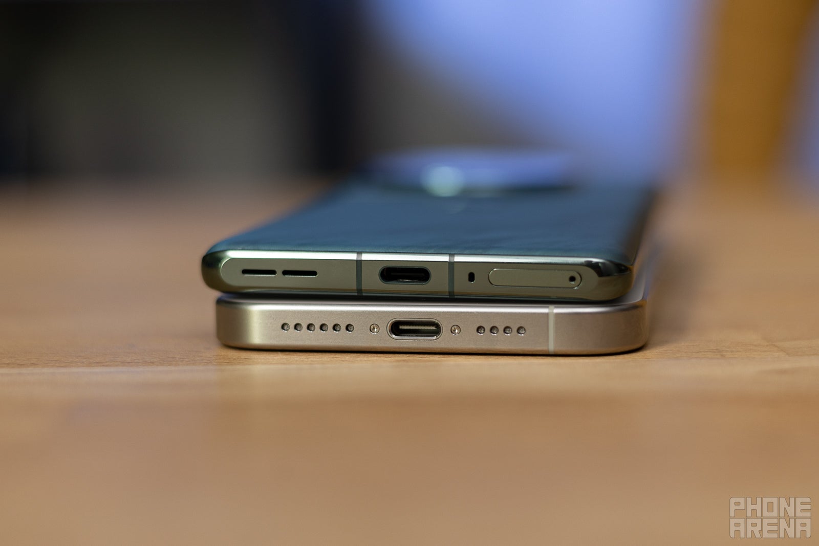 Speakers and USB C (Image credit - PhoneArena) - OnePlus 12 vs iPhone 15 Pro Max: will this ever be settled?