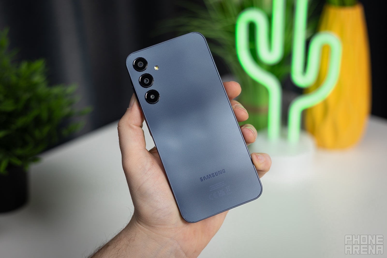This checkered pattern is somehow more noticeable in pictures than in real life (Image by PhoneArena) - Samsung Galaxy A25 5G Review: Mr. Average