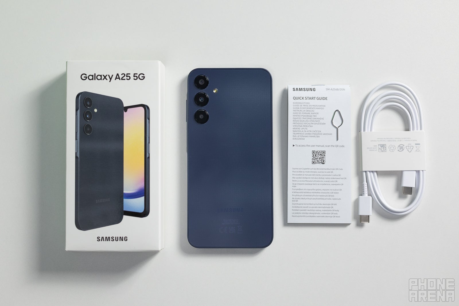 In the Galaxy A25 5G box, you have a cable and a user manual, but no charger (Image by PhoneArena) - Samsung Galaxy A25 5G Review: Mr. Average