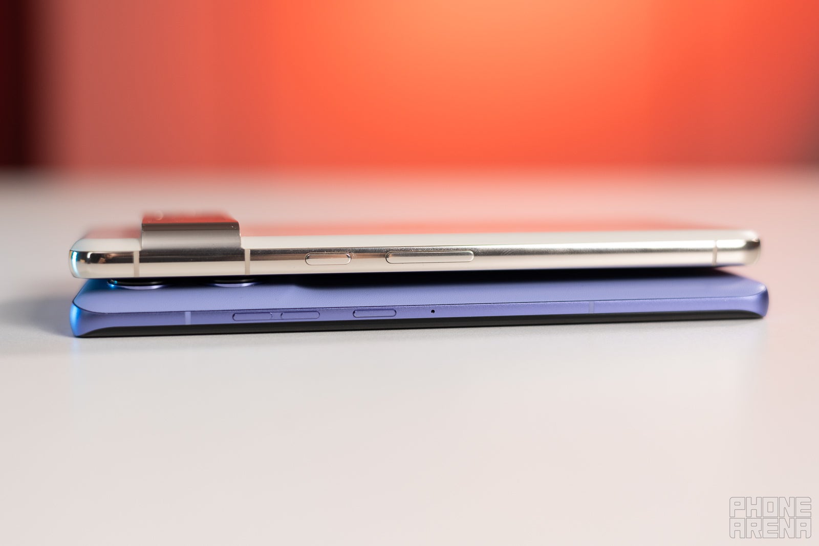Side by side or rather on top of each other (Image credit - PhoneArena) - Motorola Edge 50 Pro vs Google Pixel 8 Pro: Neck and neck