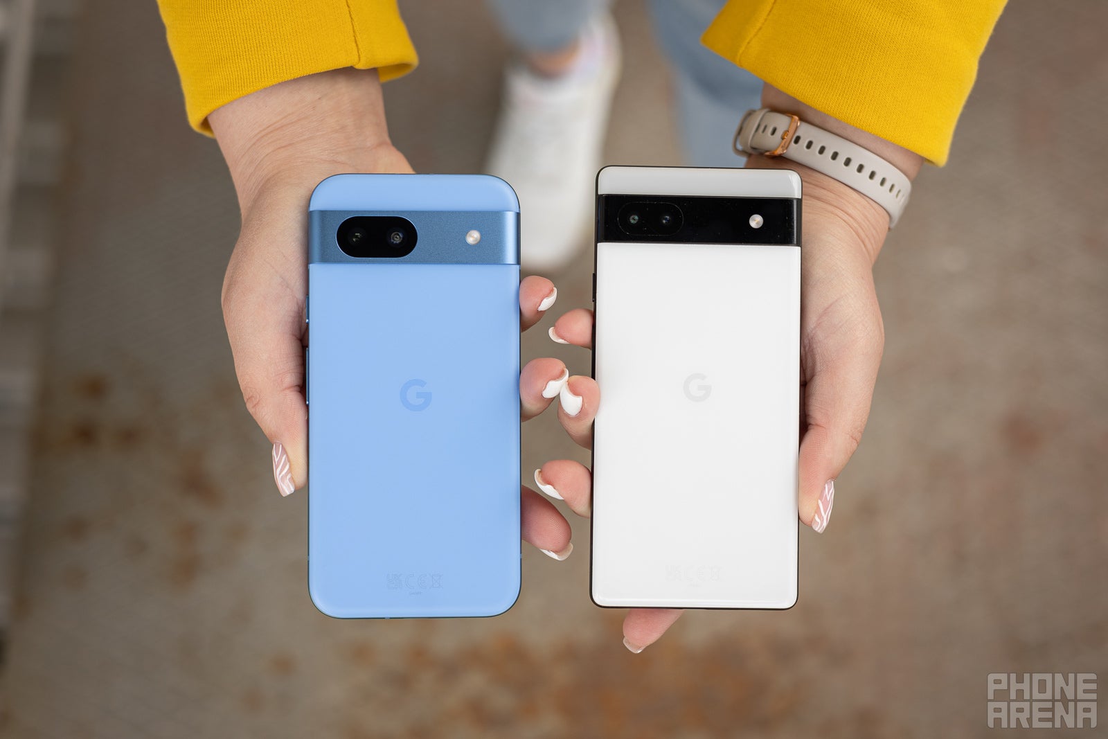The Pixel 8a is rounder, but also heavier (Image by PhoneArena) - Google Pixel 8a vs Pixel 6a: What&#039;s new in two years of evolution