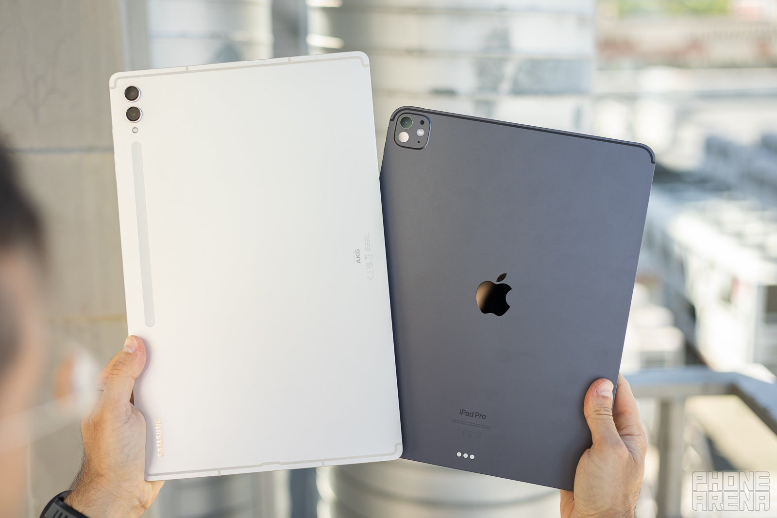 iPad Pro 2024 and Galaxy Tab S9 Ultra showing their backs to the camera