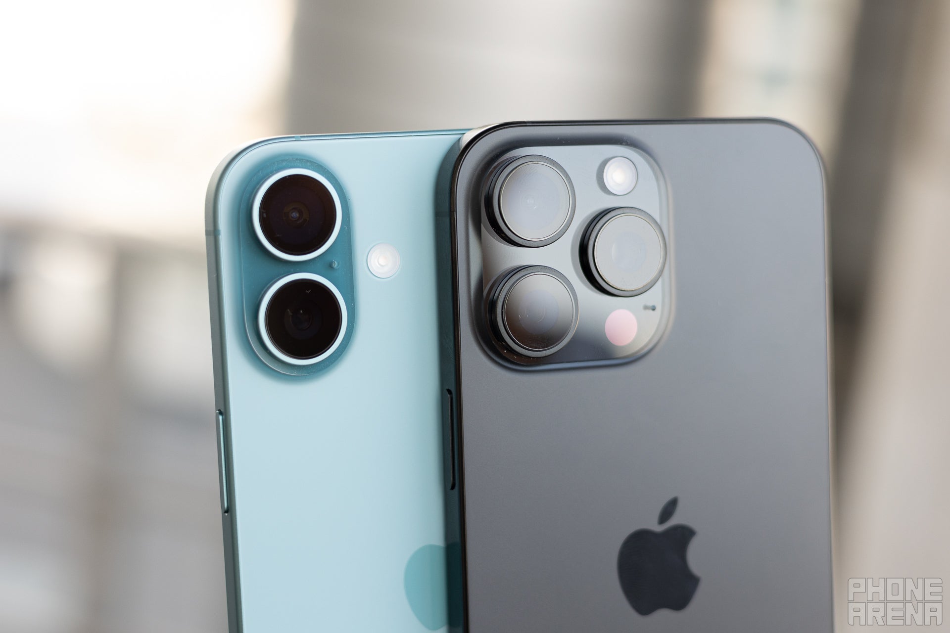 Close-up shot of the camera units on the Apple iPhone 16 Pro Max and the iPhone 16 Plus