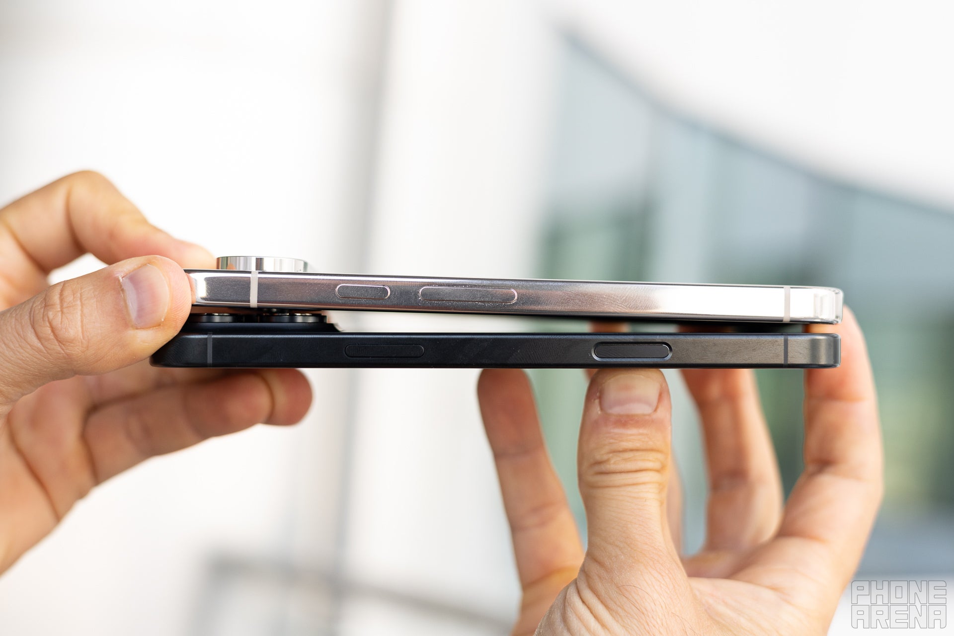 A side view of the iPhone 16 Pro Max and Pixel 9 Pro XL.