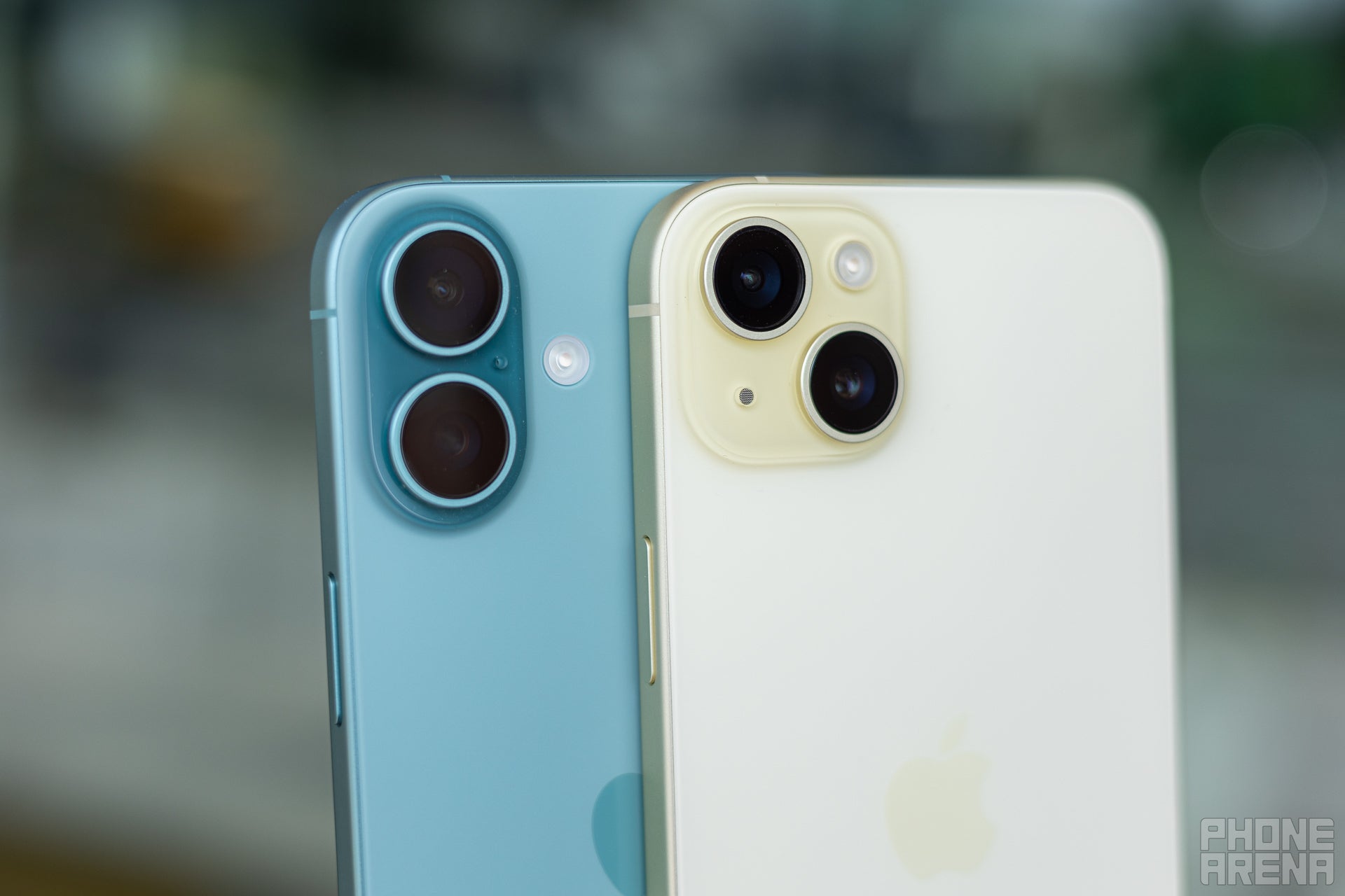 A close-up shot of the camera modules on the Apple iPhone 16 Plus next to iPhone 15 Plus