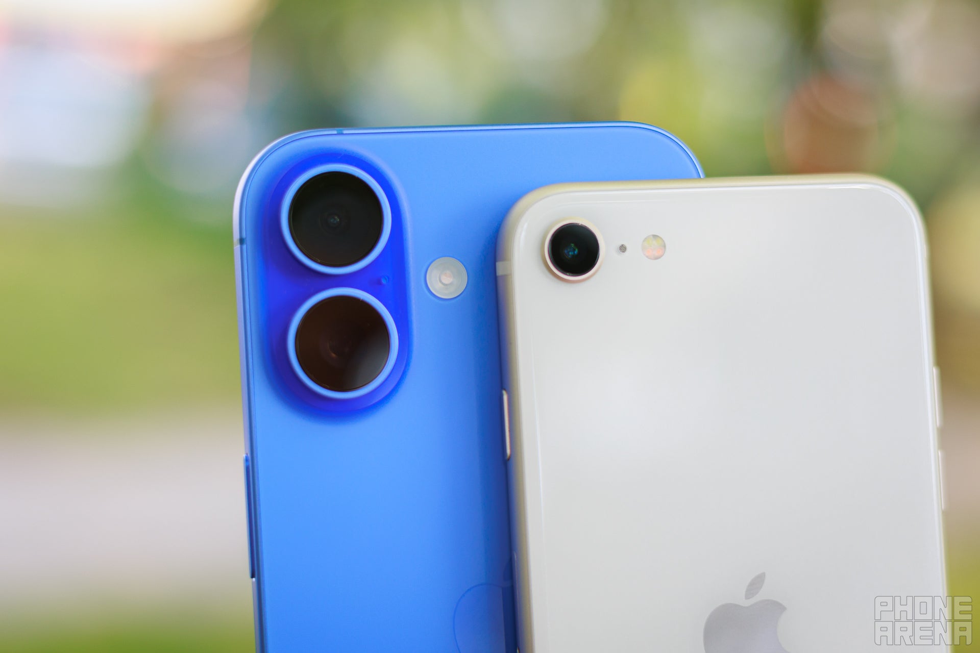 You can barely tell that the SE has a camera, which might be the preference for some, compared to the massive camera module on the iPhone 16. | Image by PhoneArena - iPhone 16 vs iPhone SE 2022: It&#039;s worth paying the extra buck