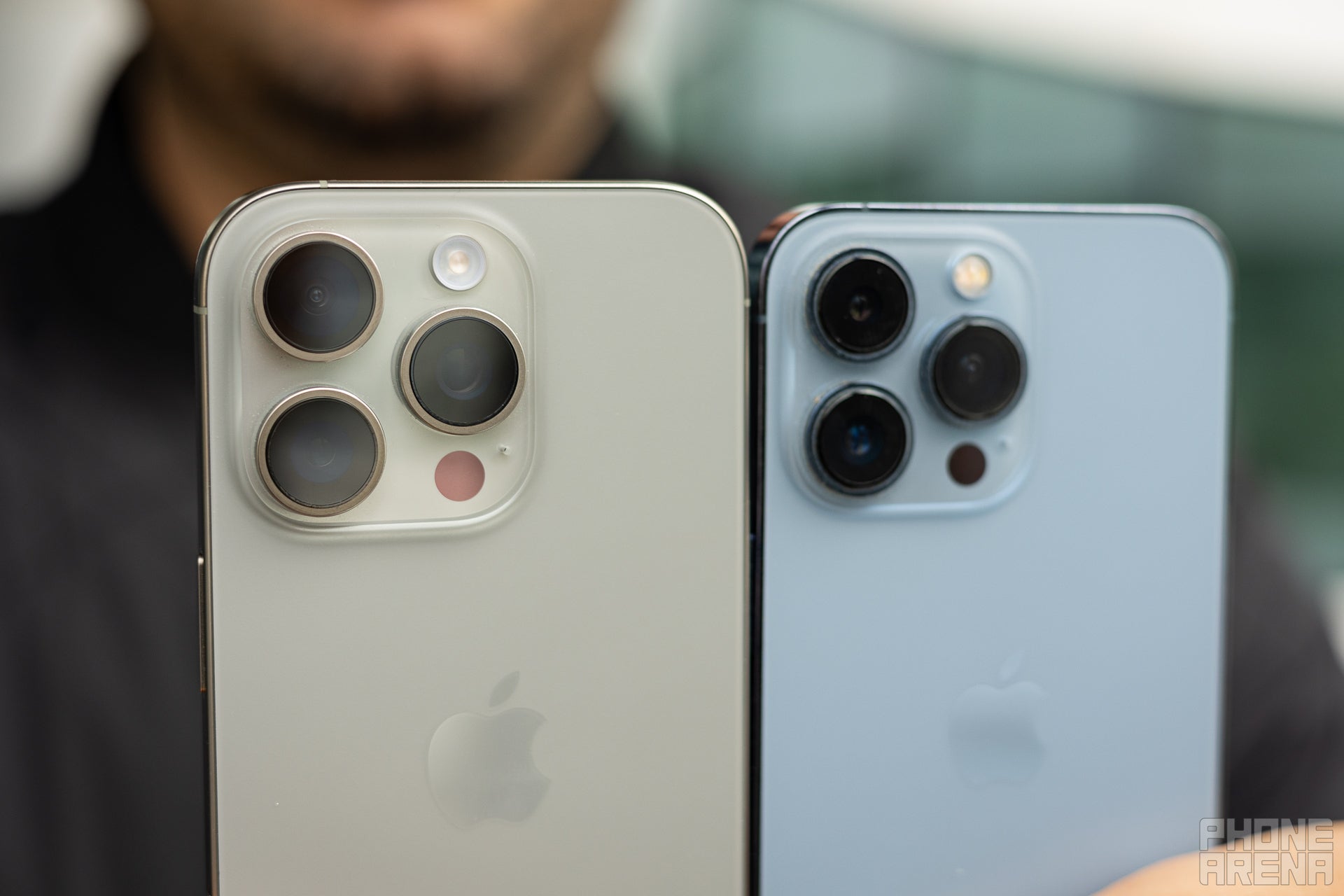 A close-up picture of the camera modules on the Apple iPhone 16 Pro and the iPhone 13 Pro