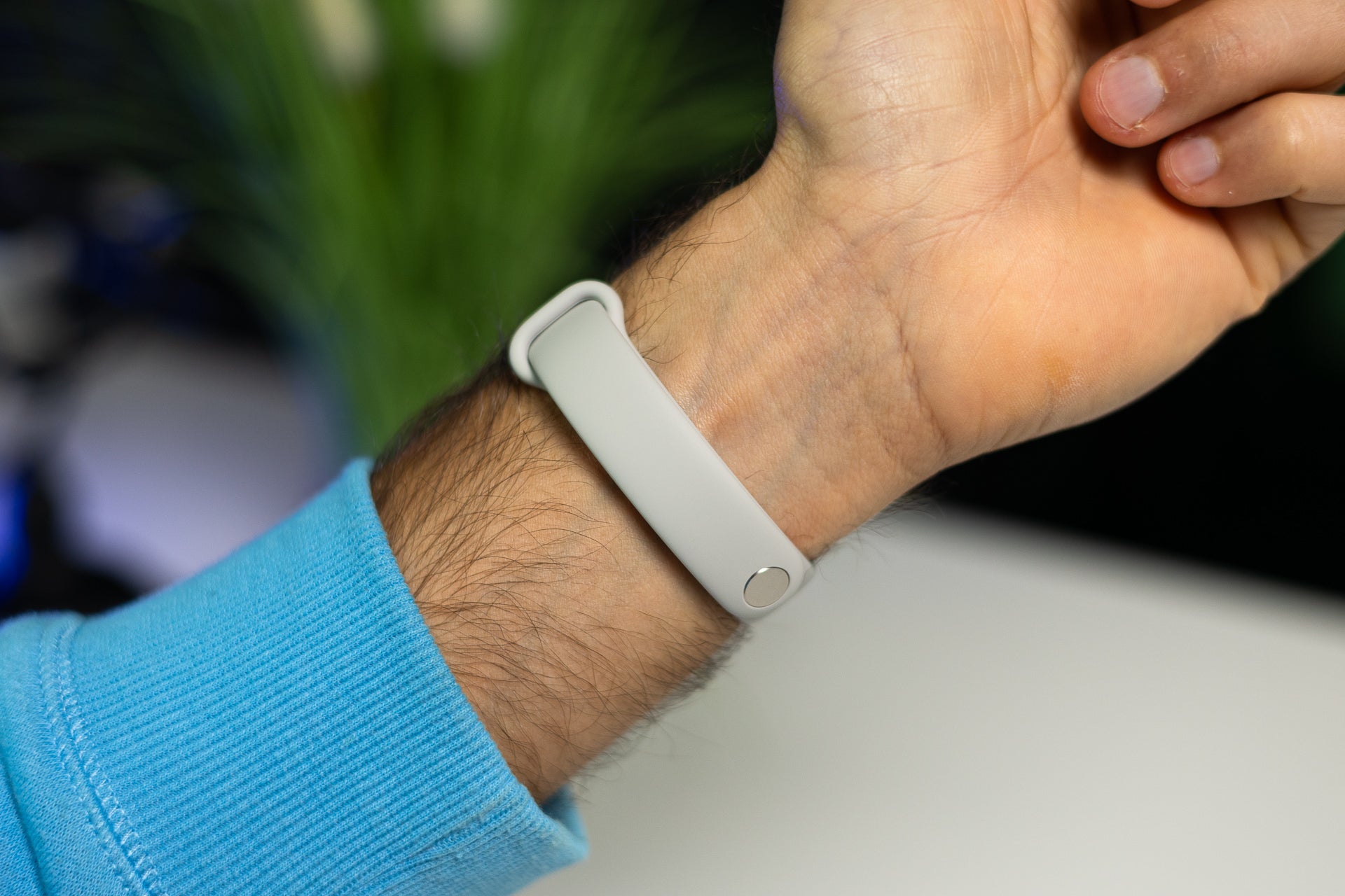 The silicone strap is hard to put on, but very comfortable afterwards | Image by PhoneArena - Xiaomi Smart Band 9 Review: A great fitness tracker on a budget