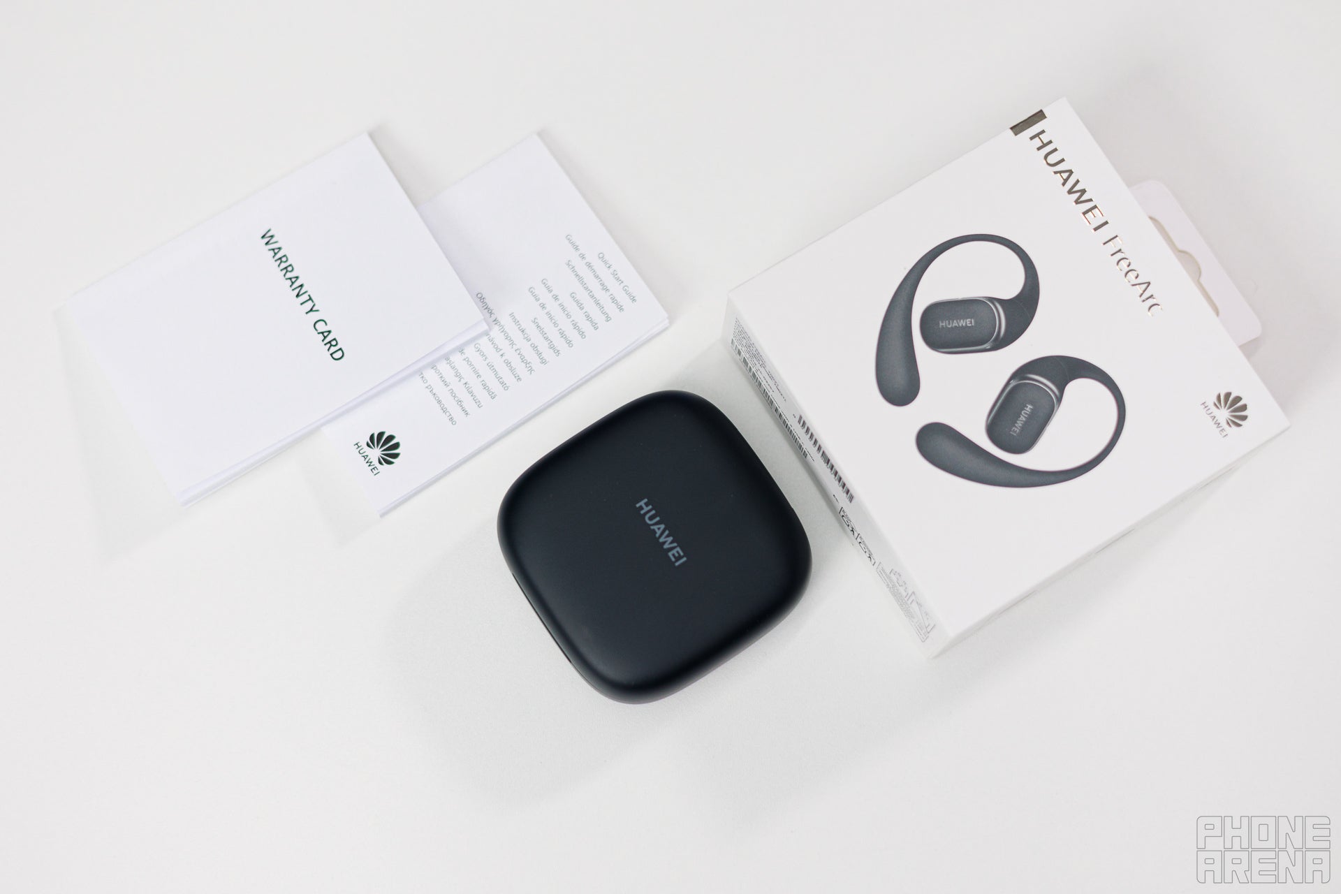 Box... contents? There isn&#039;t even a cable (Image credit - PhoneArena) - Huawei FreeArc: hook, line, open-ear earbuds