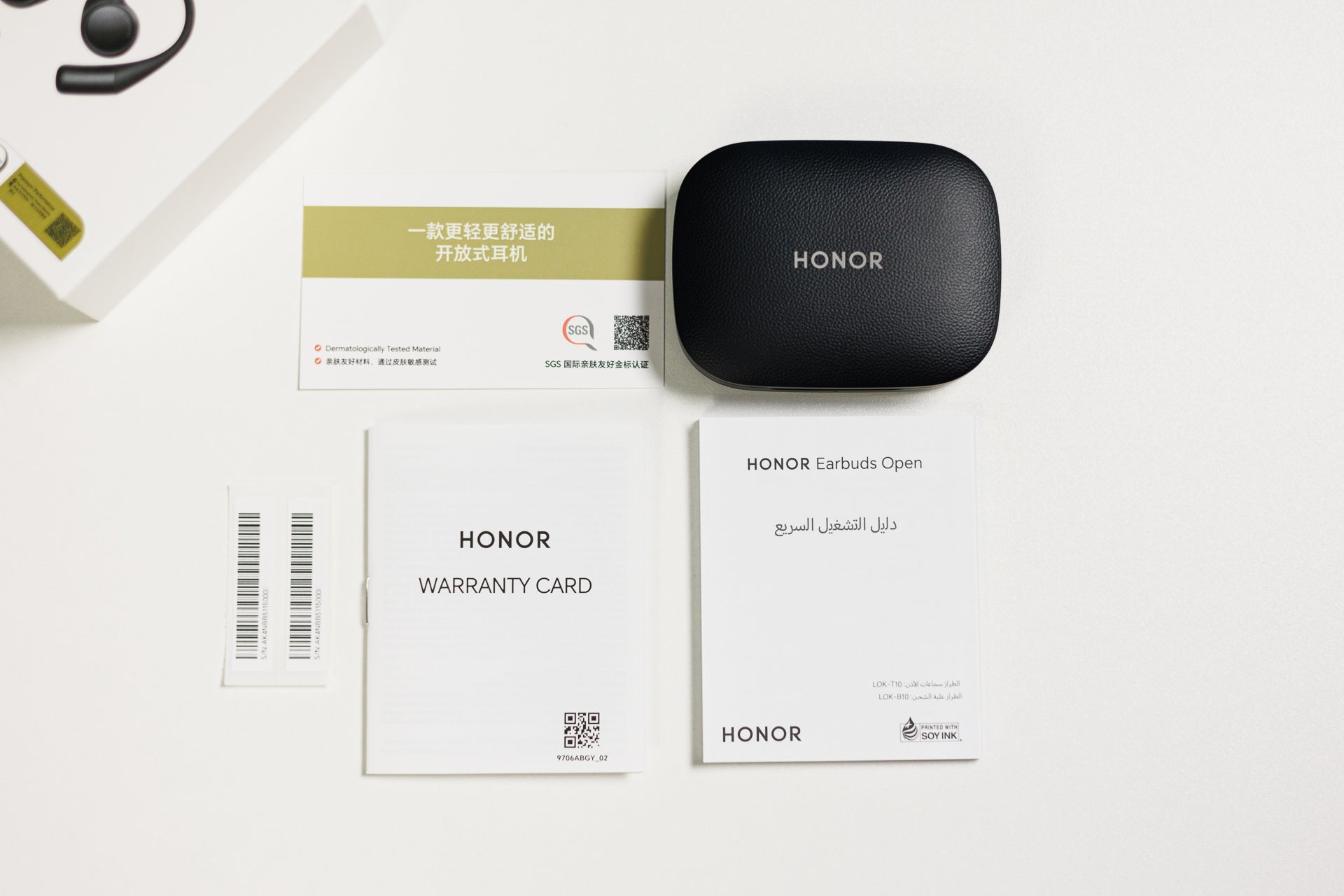 You don't get a lot of case candy with the Honor Earbuds Open, just the case with the buds inside and some paperwork | Image by PhoneArena - Honor Earbuds Open Review: A great in-ear alternative