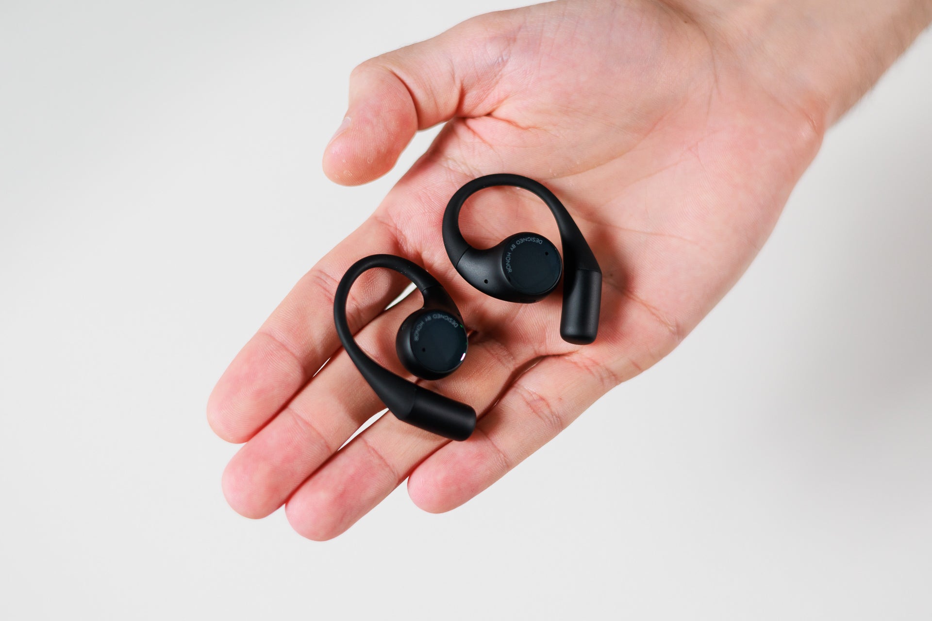 These are a great open-ear headphones and a great in-ear alternative for people with sensitive ears | Image by PhoneArena - Honor Earbuds Open Review: A great in-ear alternative