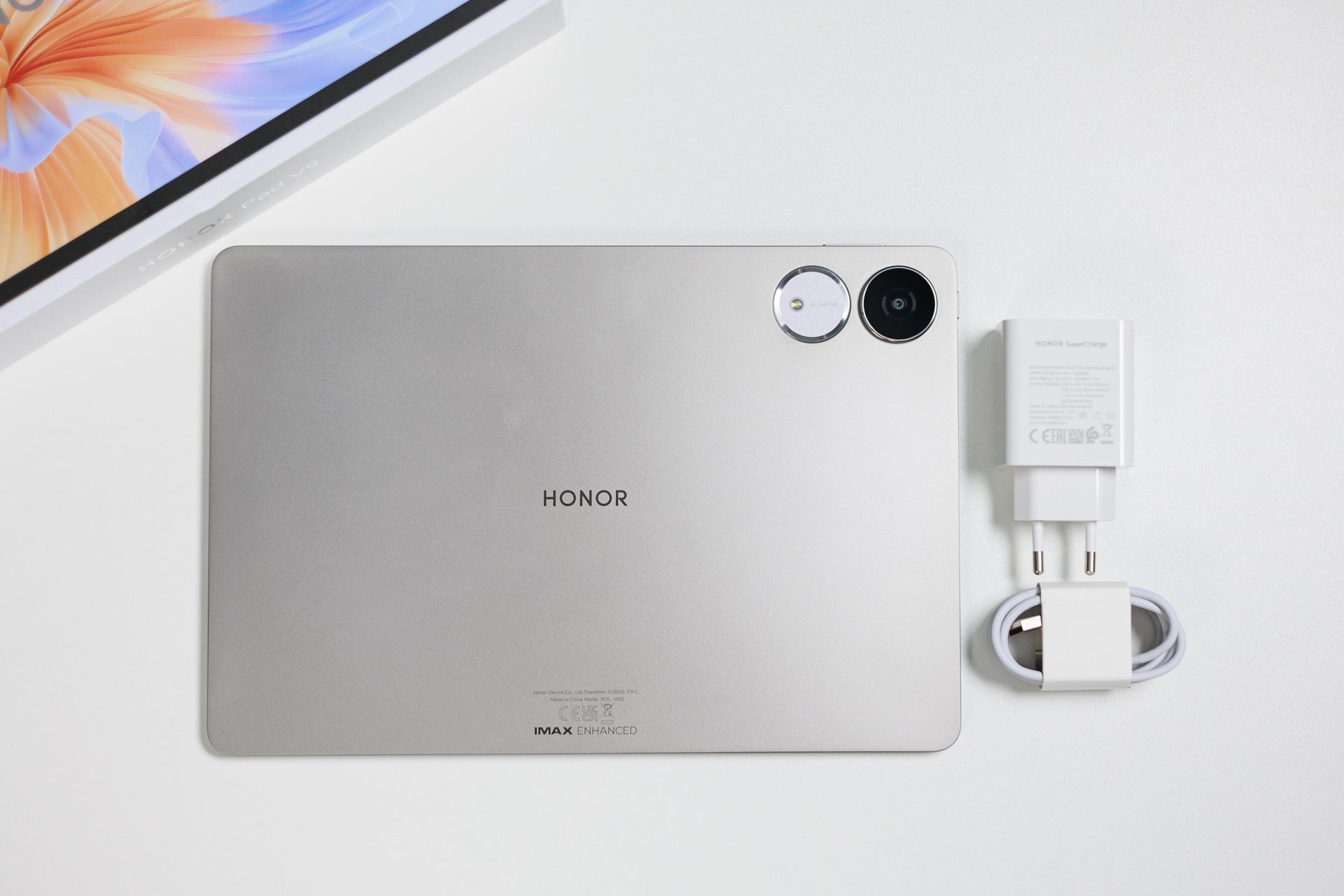 Inside the retail box you will find the basics - a charging brick and a USB-C cable | Image by PhoneArena - Honor Pad V9 Review: Should the iPad shake in fear?