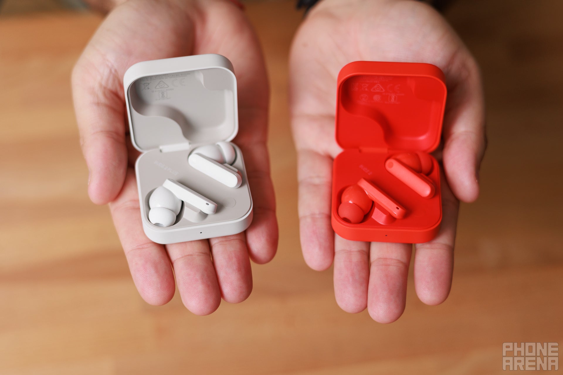 Which way, budget audiophile? (Image Credit-PhoneArena) - CMF Buds 2 Plus and Buds 2 Review: Budget earbuds with flagship sound - what’s the real difference?