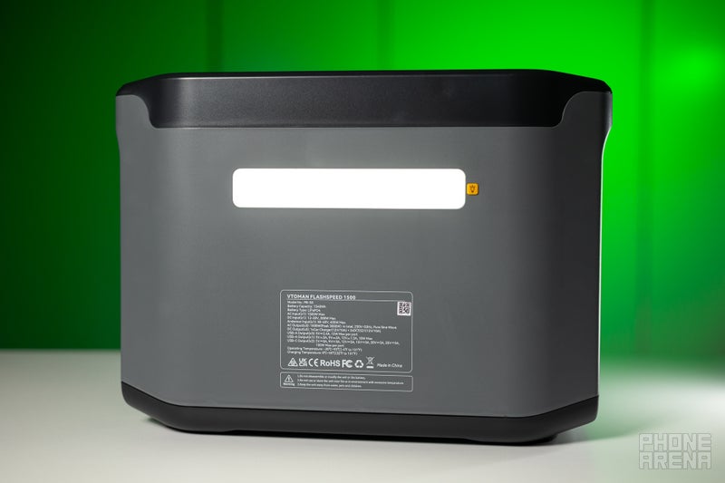 The Vtoman FlashSpeed 1500 back side with its LED light turned on.