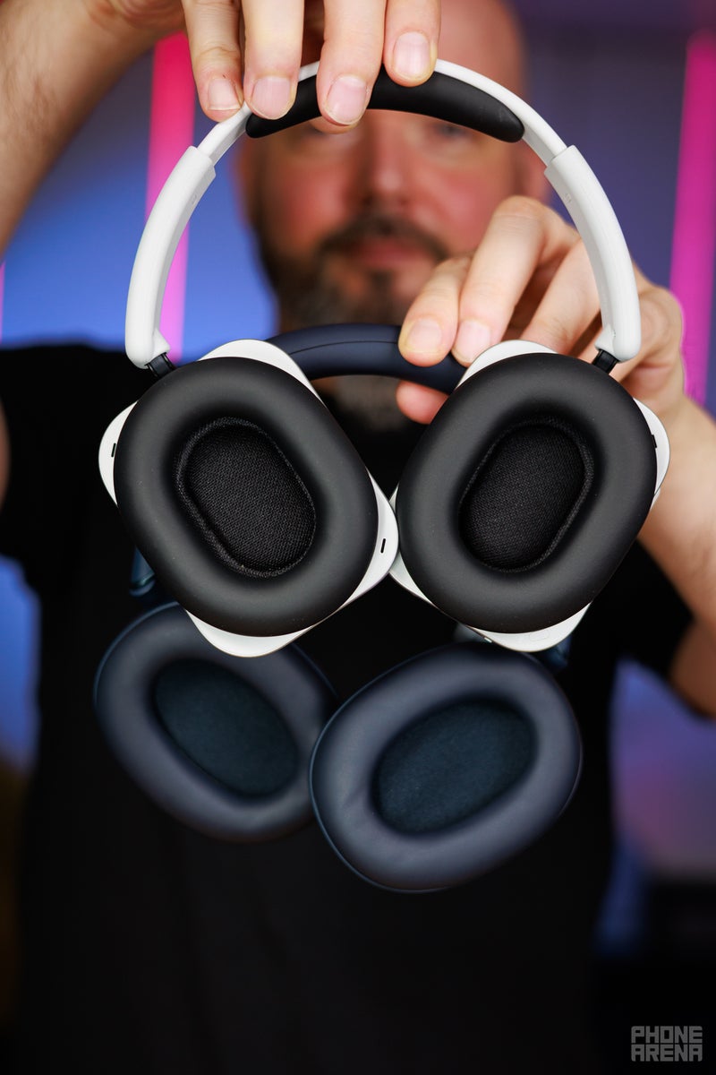 Nothing Headphone (1) and Sony WH-1000XM6 held against the camera, showing the insides of the earcups