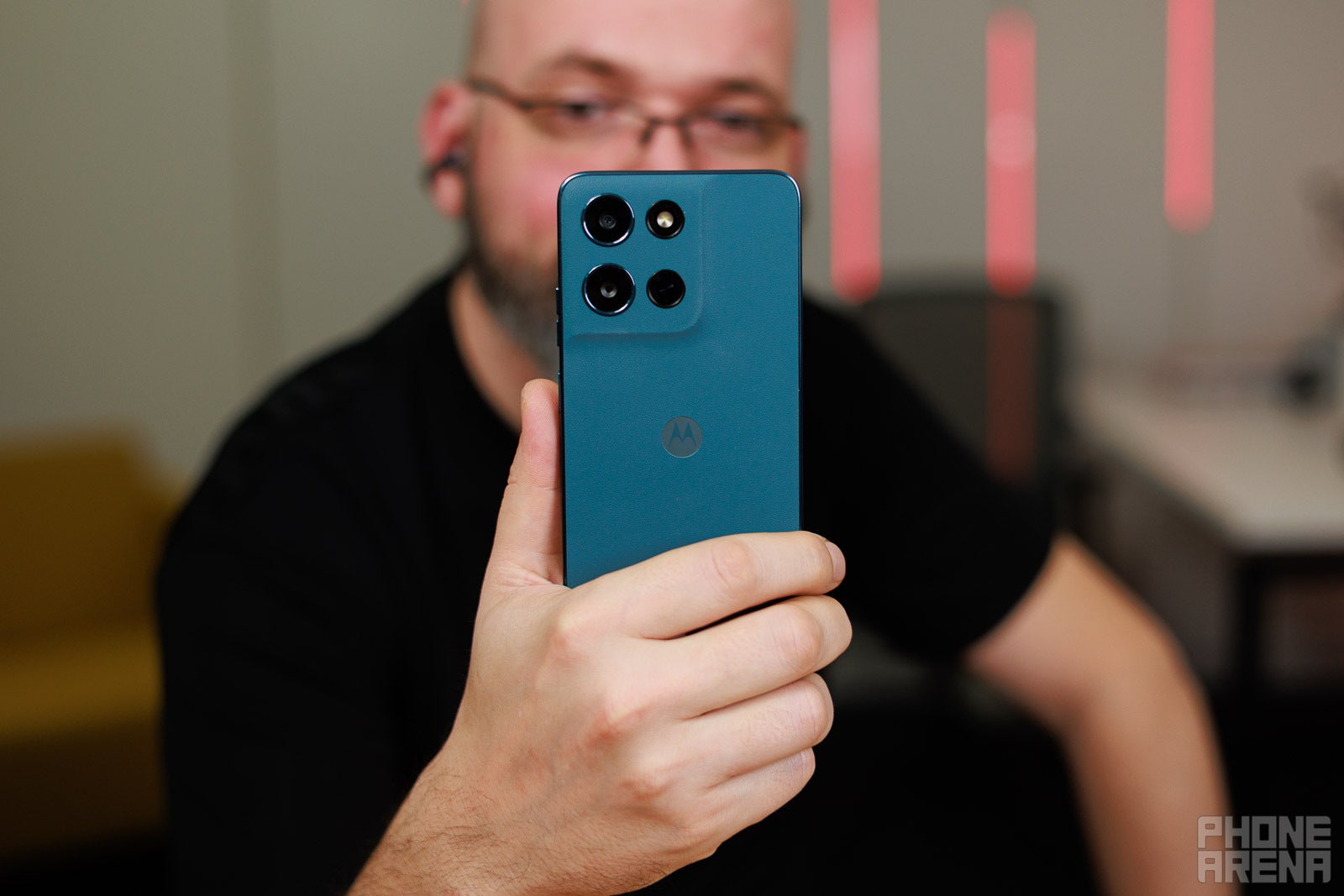 Moto G Play 2026 back held in hand.