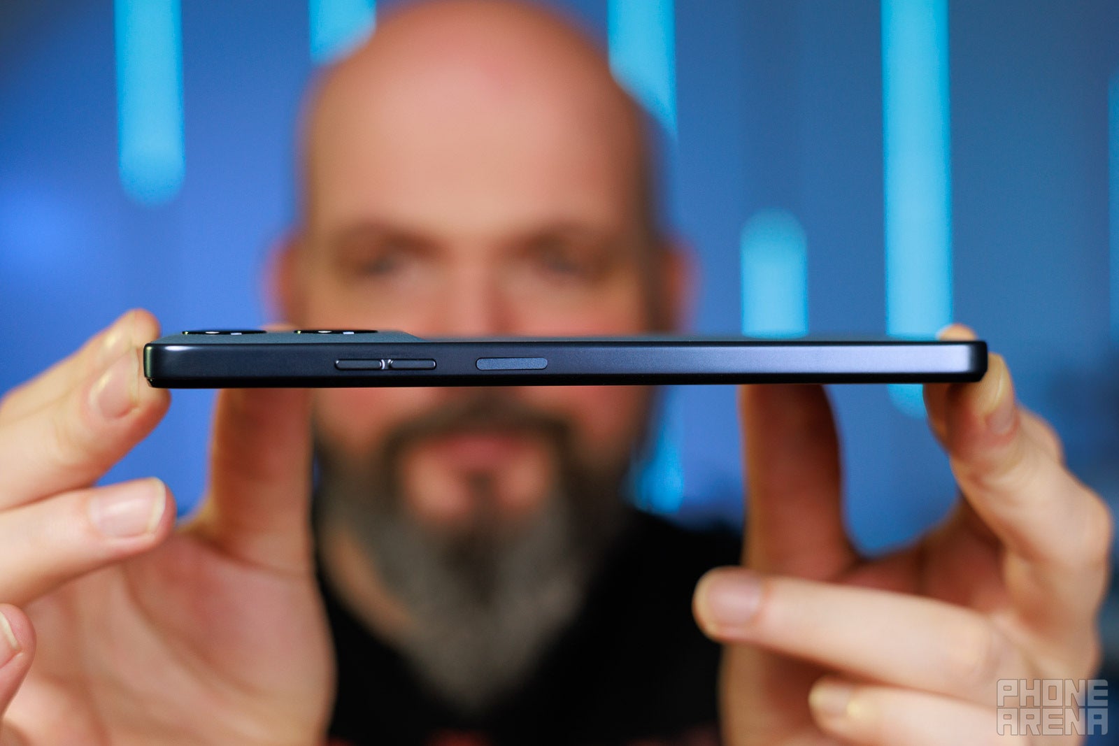 Side profile of smartphone showing thin frame and buttons