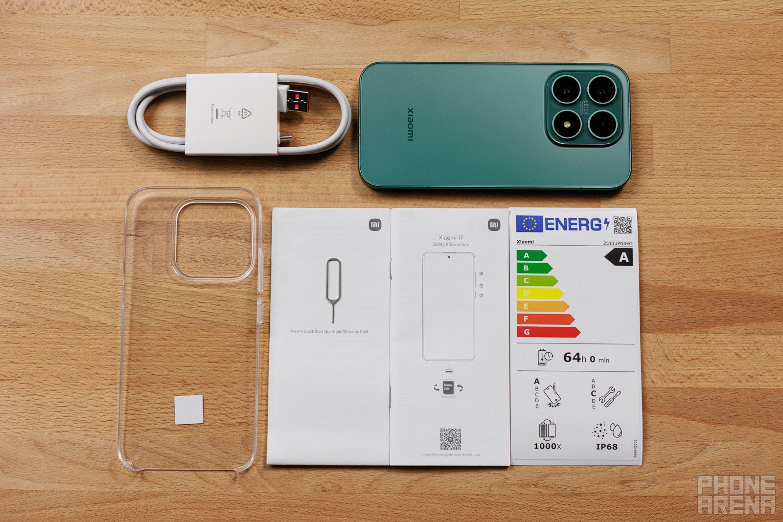 Unboxing the Xiaomi 17. | Image by PhoneArena - Xiaomi 17 Review: Formulaic but totally brilliant execution