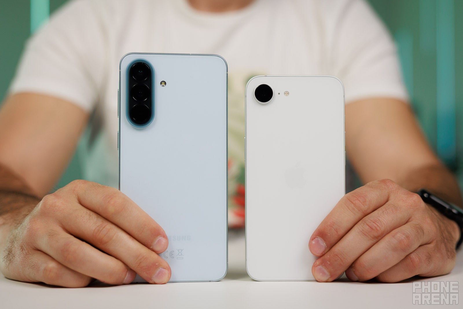 Image by PhoneArena - Galaxy A57 vs iPhone 17e: Samsung nailed the design, but Apple still rules this one crucial area