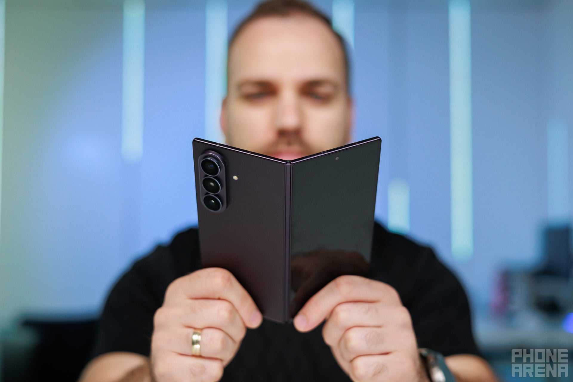 Nobody would hold it like that in real life, but it works for the picture. | Image by PhoneArena - Samsung Galaxy Z Fold 8 Ultra Review: Is this the ultra form-factor?