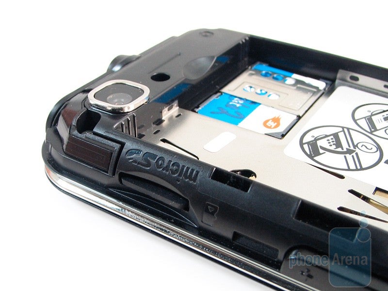 Battery, SIM card and microSD slots - Nokia 6790 Surge Review