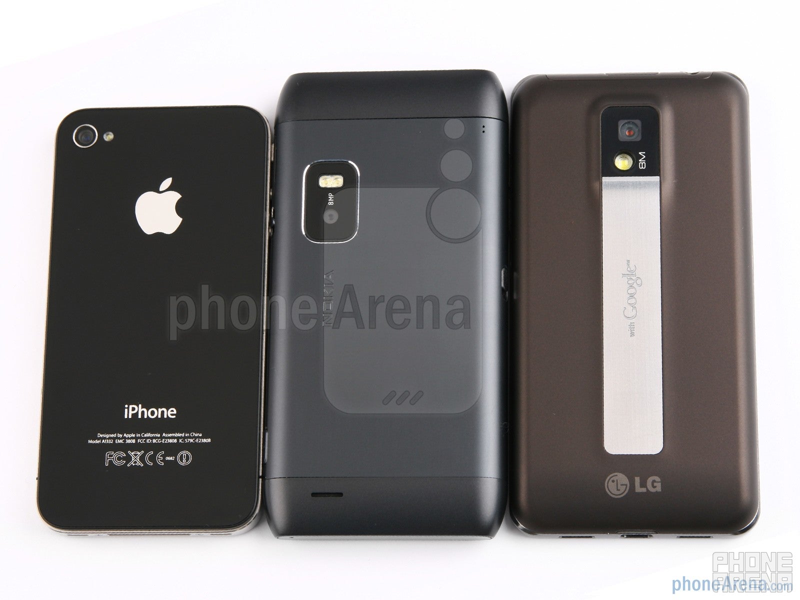 Backs - Nokia E7 vs LG Optimus 2X vs Apple iPhone 4